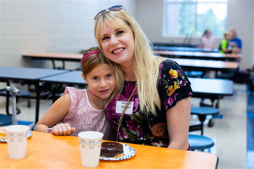 Sunset Elementary hosts Donuts with Grown-Ups
